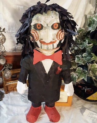 Illustration for article titled World’s greatest Etsy page selling terrifying horror-themed piñatas